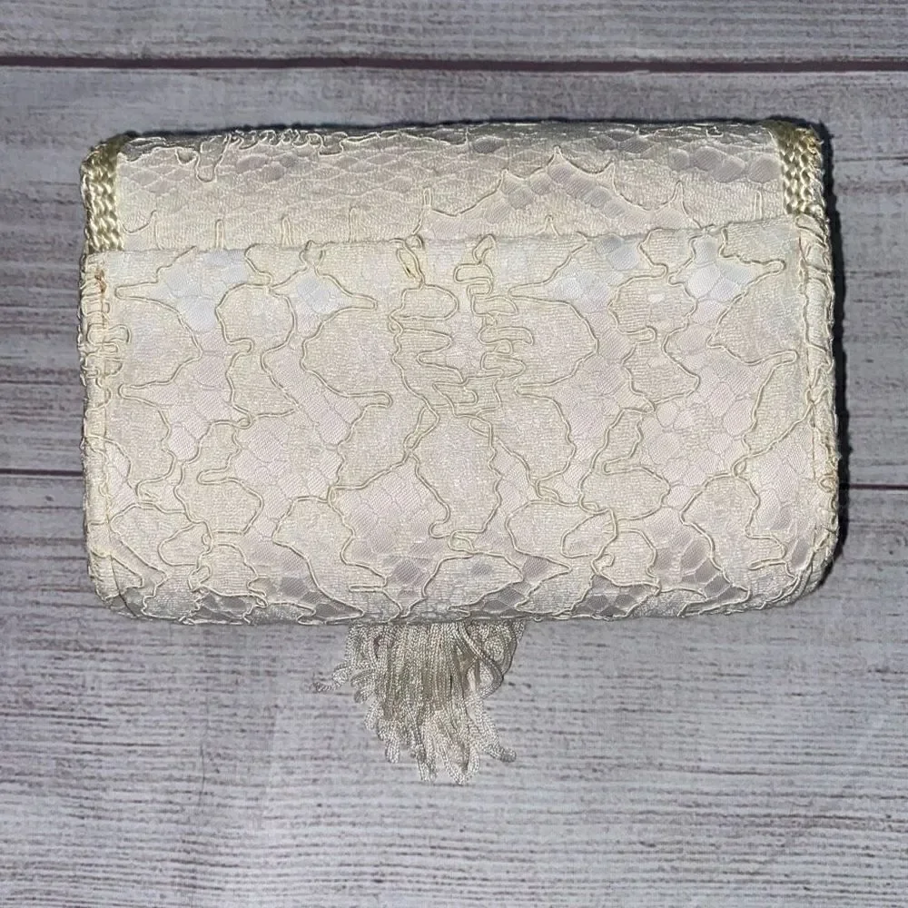 La Regale LTD vintage lace clutch w/nylon chord strap & fringe tassle white